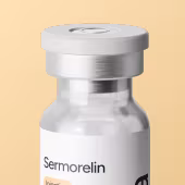 Small vial labeled Sermorelin with a silver cap on a light background.
